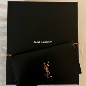 Saint Laurent phone clutch/small bag. Fits phone, key and a few cards.
